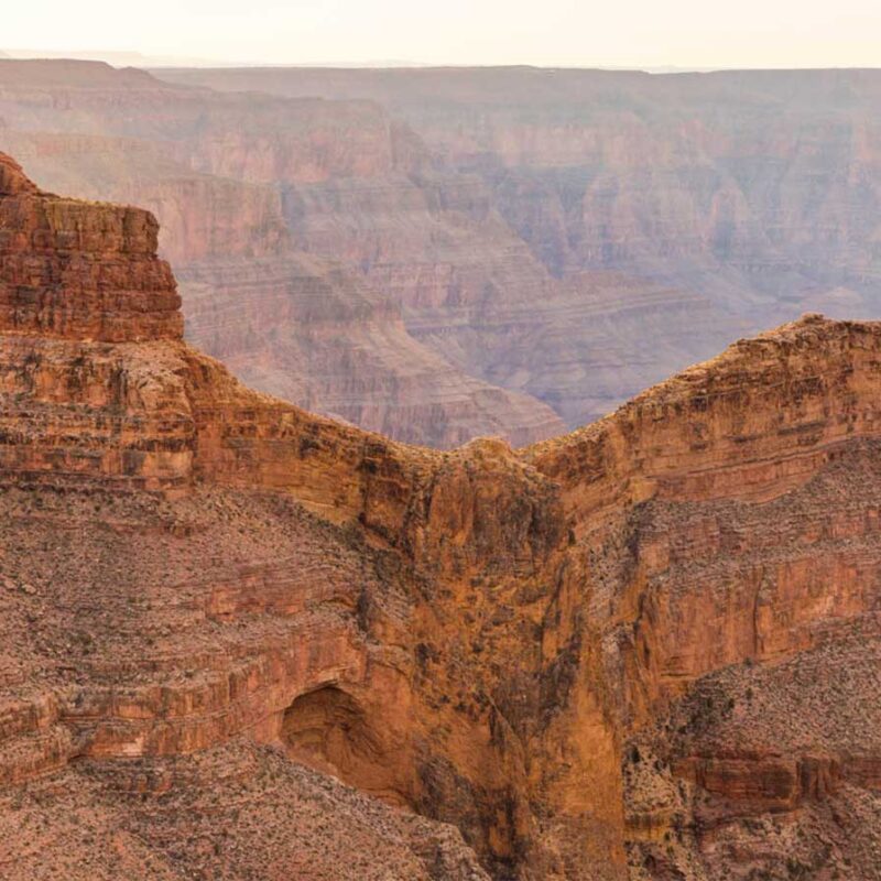 Deep canyon with layered rock formations.