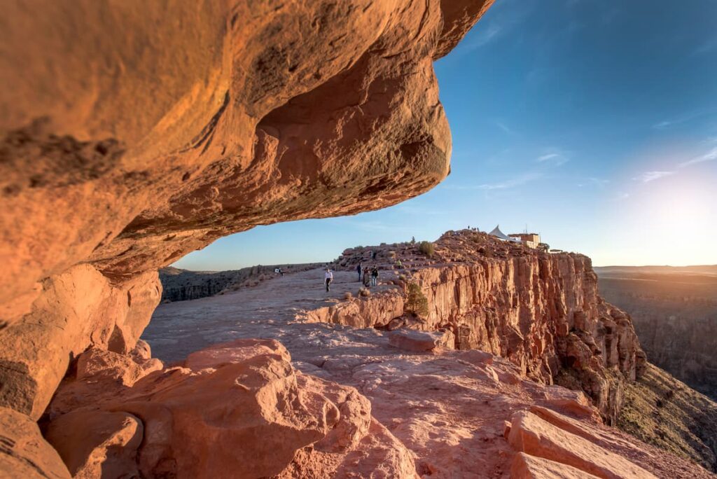 grand_canyon_west_guano_point_sunrise View under a rock formation at the Grand Canyon West.