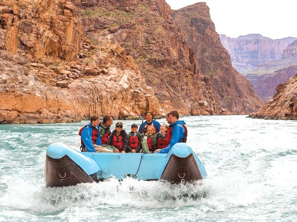 A raft full of people on the Colorado River.