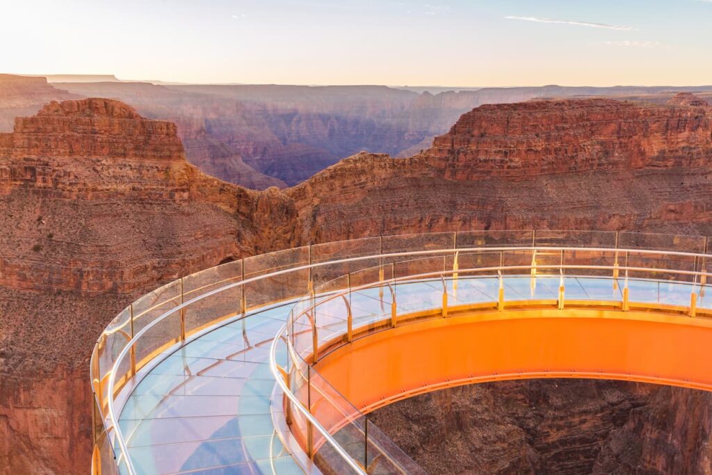 Make Father’s Day Grand with a BOGO Adventure to Grand Canyon West Glass horseshoe-shaped Grand Canyon Skywalk extending over a red-rock canyon.