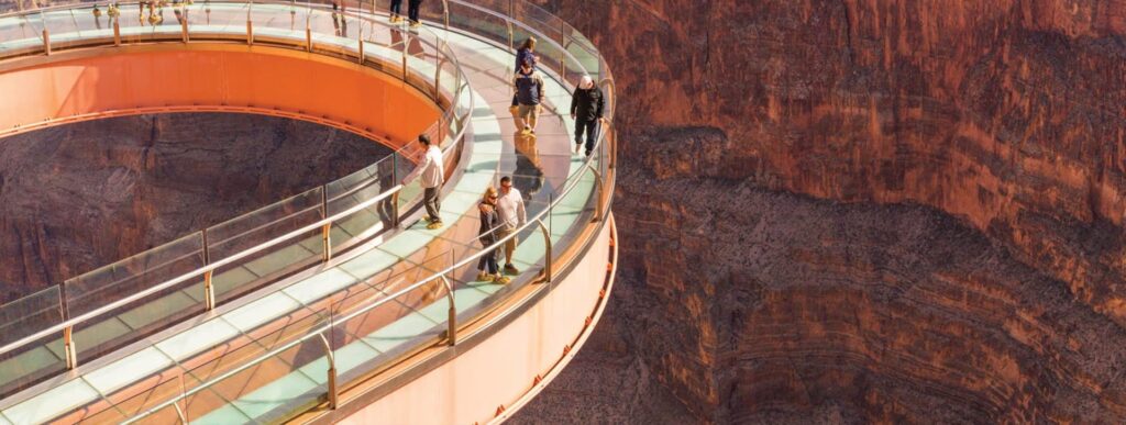 Skywalk People walk on the glass Grand Canyon Skywalk over the canyon.